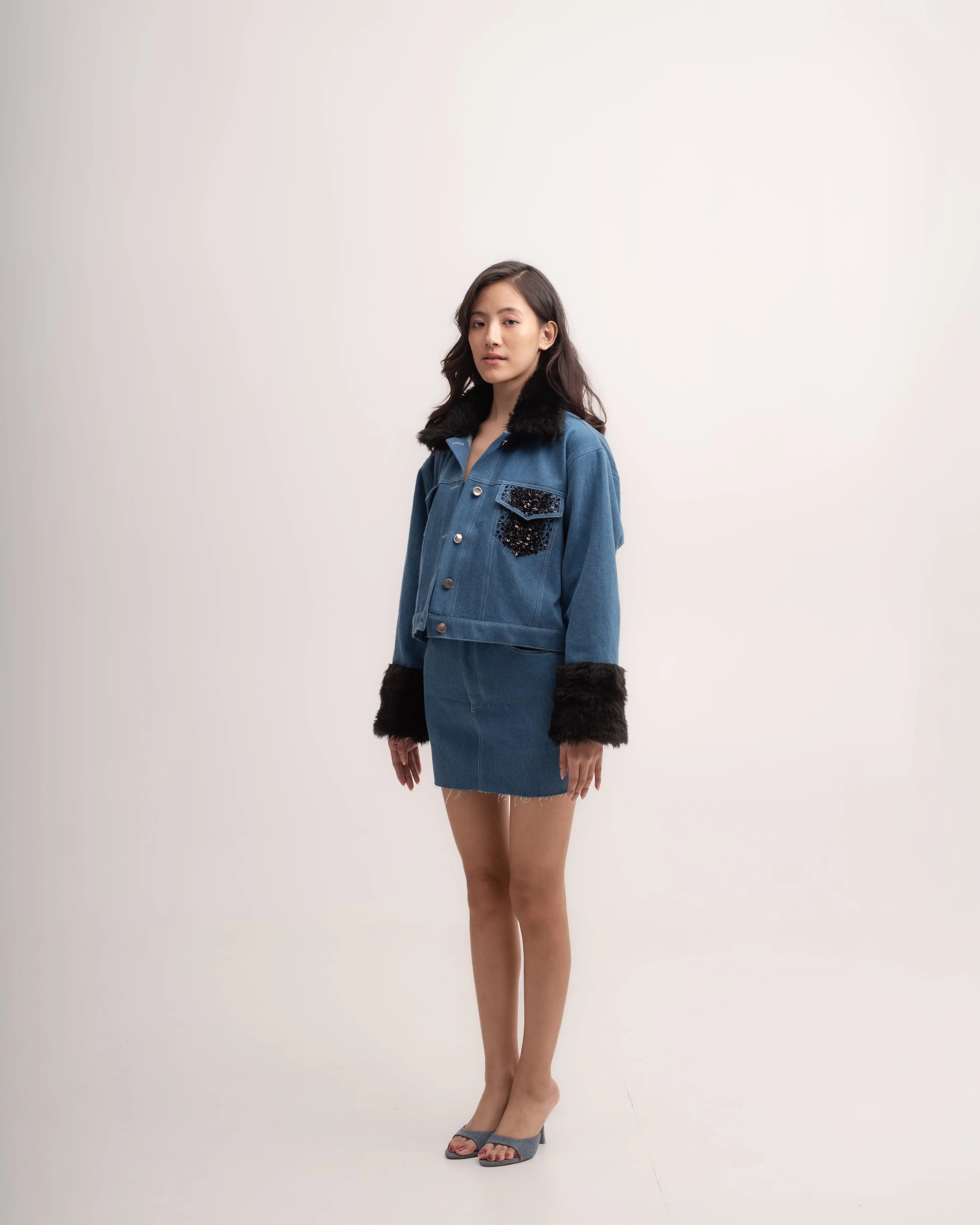 Denim faux fur jacket with sequin pockets